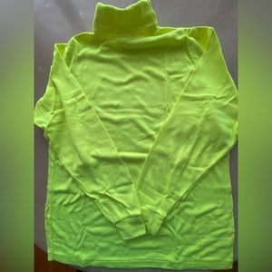 Winter warm turtleneck in fabulous color. Ready for the rain or on the slopes.